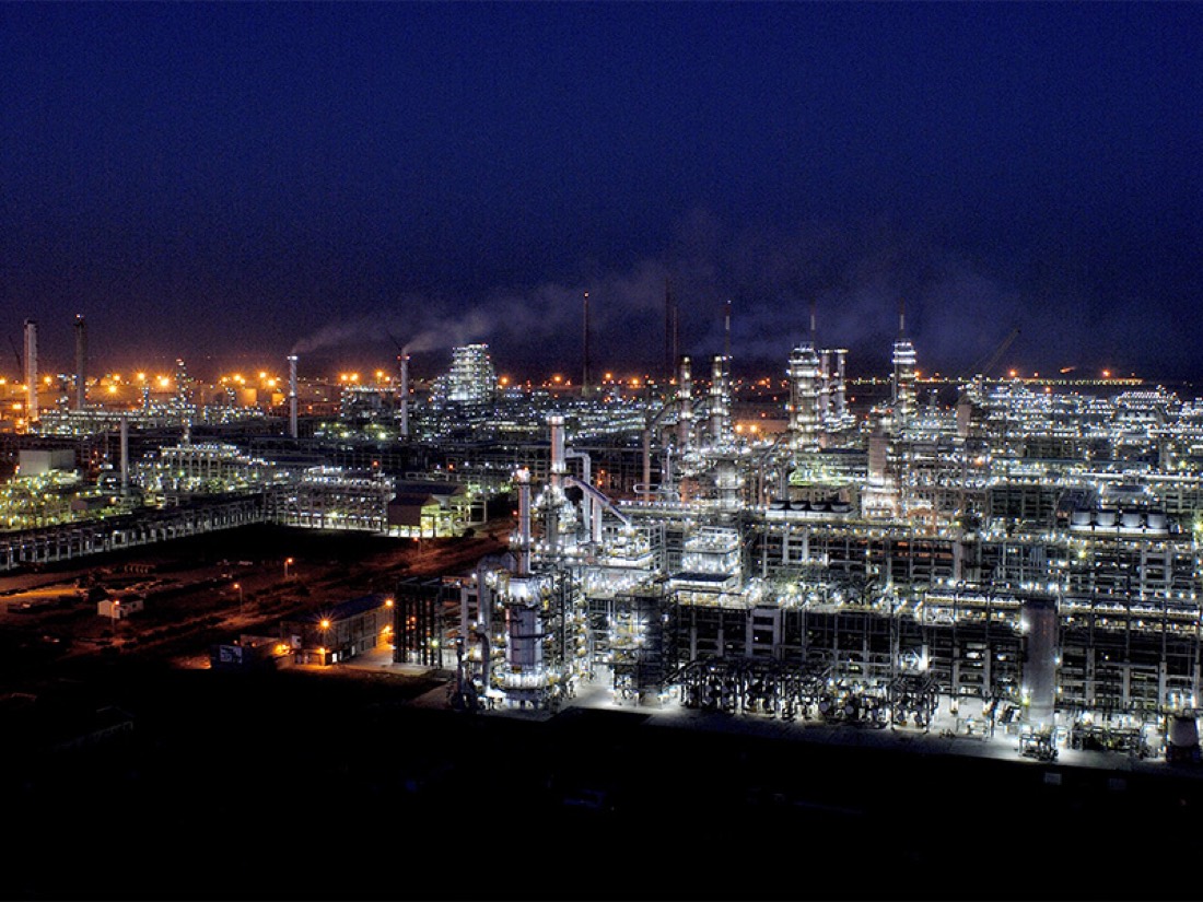 An Indian oil refinery complex, the midpoint between crude imports and the fuels that set input costs across sectors